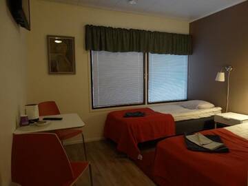 Фото номера Двухместный номер с 2 отдельными кроватями Отель Botnia Hotel &amp; Restaurant г. Kruunupyy 10